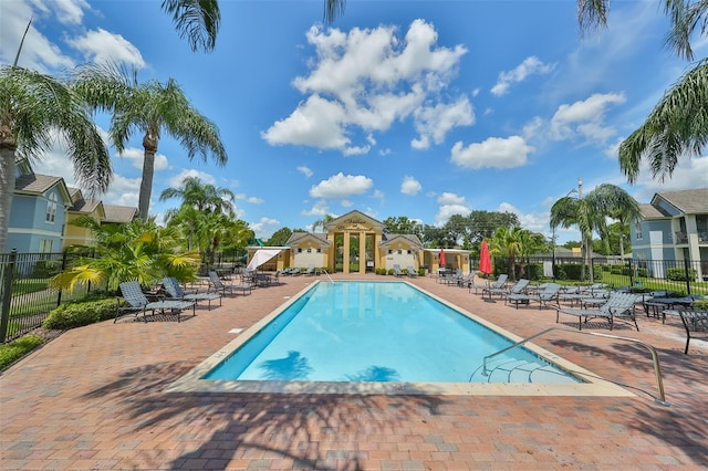 view of pool featuring a patio