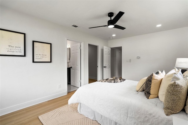 bedroom featuring light wood-type flooring and ceiling fan