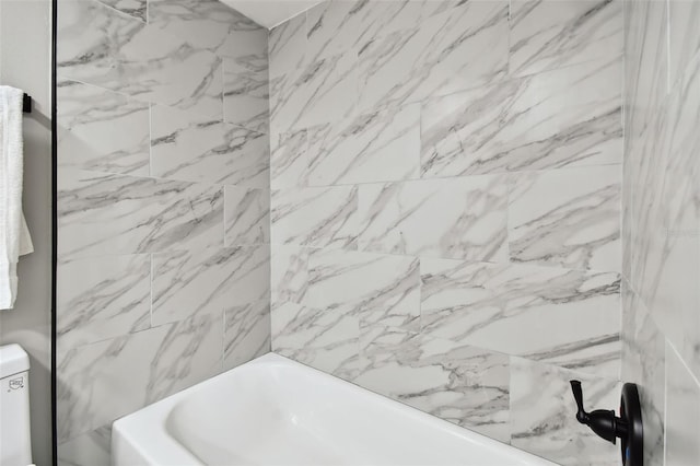 5095 Bay St NE Unit 306, Saint Petersburg, FL 33703 - bathroom featuring toilet and shower / washtub combination