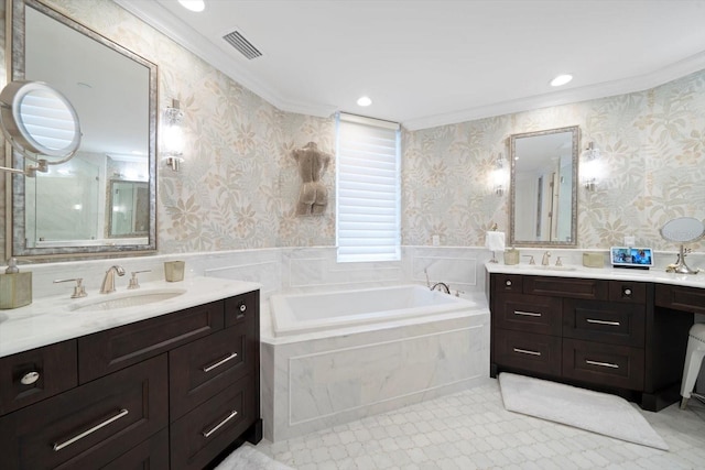 bathroom featuring a relaxing tiled tub, crown molding, and vanity