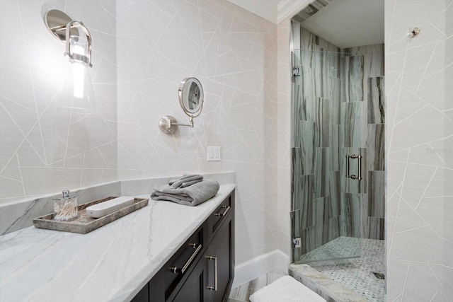 bathroom with vanity and walk in shower