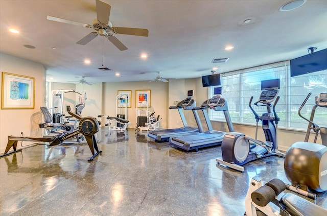 exercise room with ceiling fan