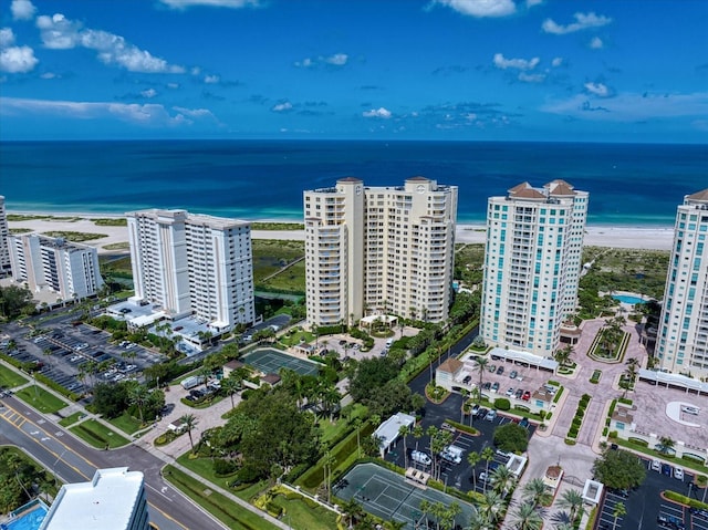 drone / aerial view with a view of the beach and a water view