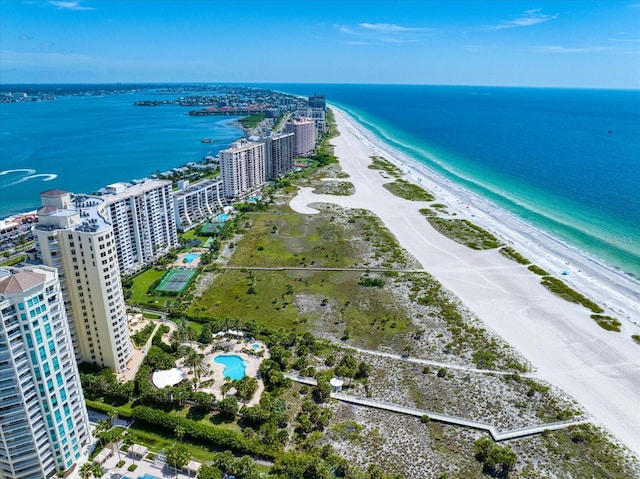 drone / aerial view with a view of the beach and a water view