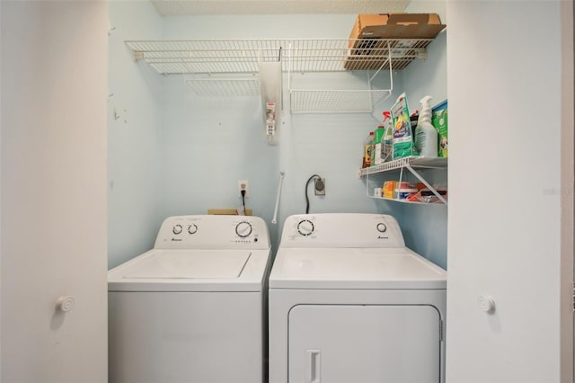 laundry area with washer and dryer