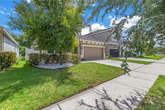 view of front of home featuring a front yard