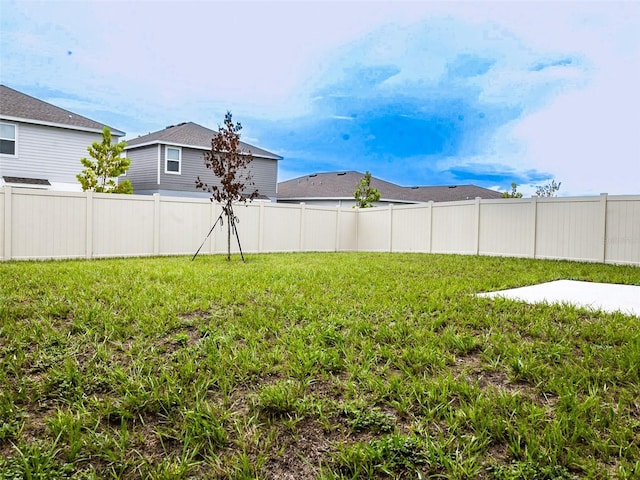 view of yard featuring fence