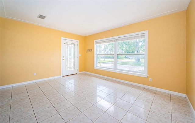 view of tiled spare room