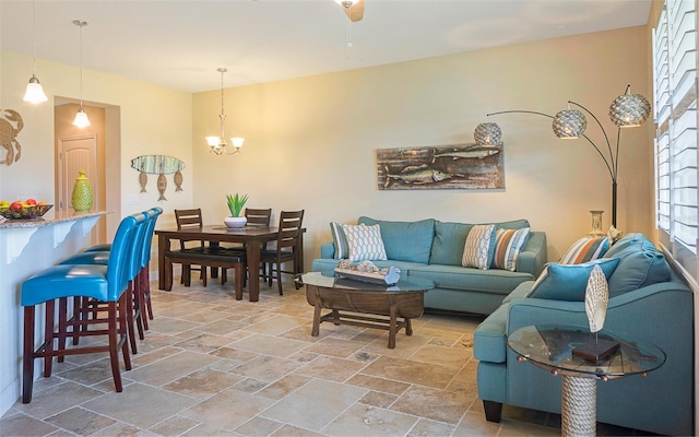 living room featuring a notable chandelier