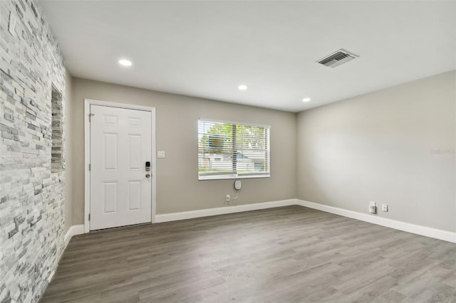 interior space with hardwood / wood-style flooring