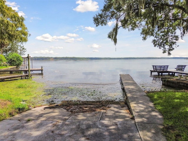 dock area featuring a water view