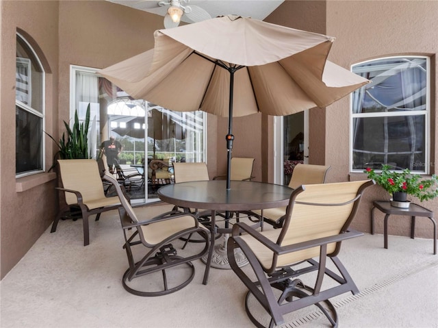 view of patio featuring outdoor dining area