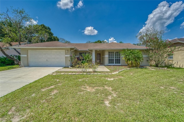 ranch-style home with a garage and a front lawn