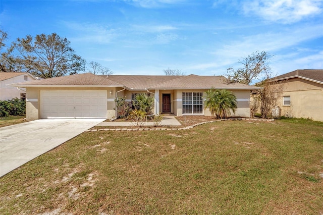 ranch-style house featuring a garage and a front yard