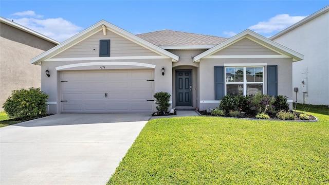 7774 Sail Clover Ln, Zephyrhills, FL 33540 - single story home with a front yard, concrete driveway, stucco siding, an attached garage, and a shingled roof