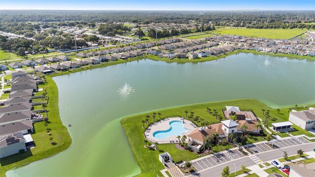 7774 Sail Clover Ln, Zephyrhills, FL 33540 - bird's eye view with a residential view and a water view