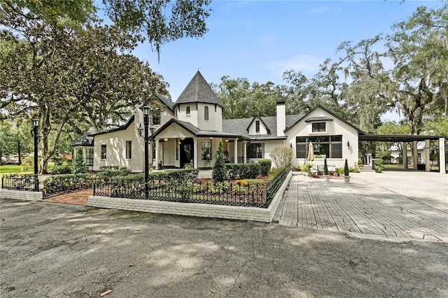 view of front facade with a carport