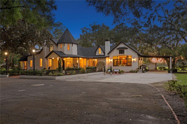 view of front of house featuring a carport