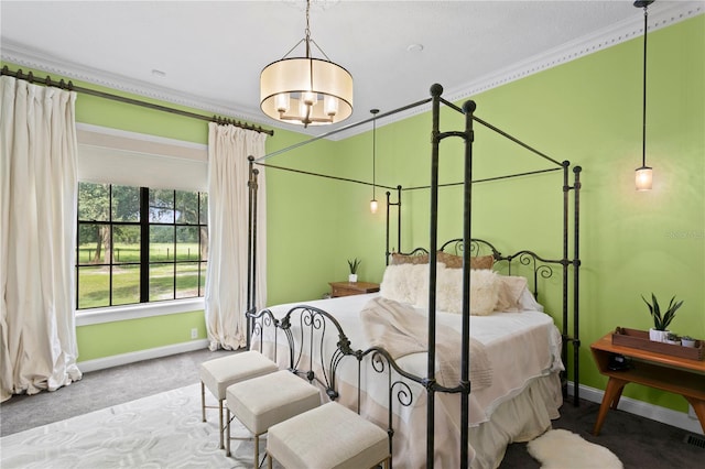 carpeted bedroom with crown molding