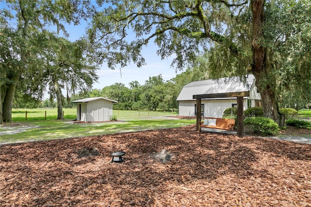 view of yard with a storage shed