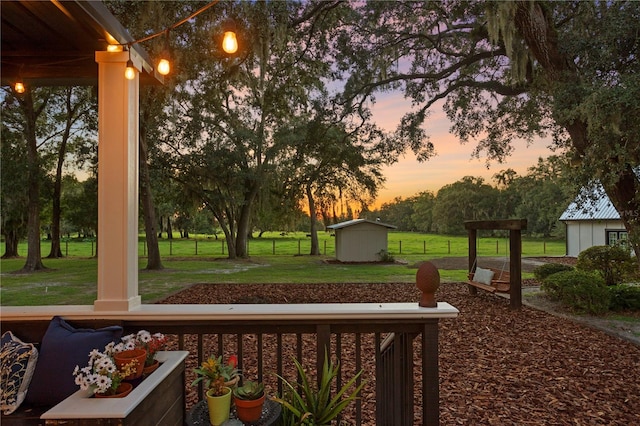 yard at dusk with a shed