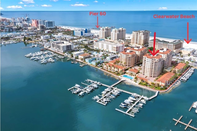 birds eye view of property featuring a water view