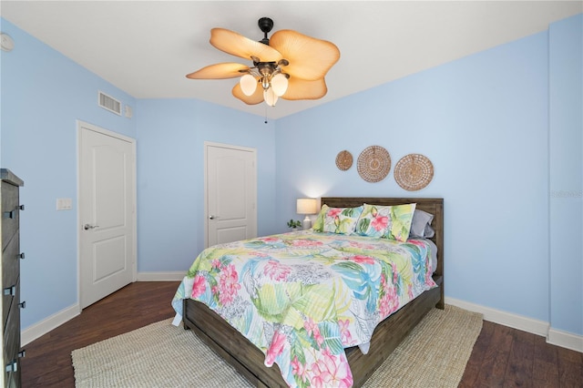 bedroom featuring dark wood-type flooring and ceiling fan