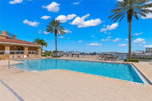 view of swimming pool with a patio area