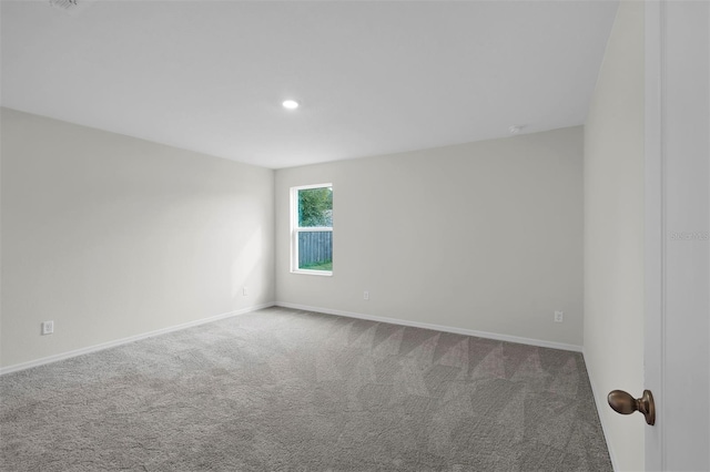 unfurnished room featuring carpet floors