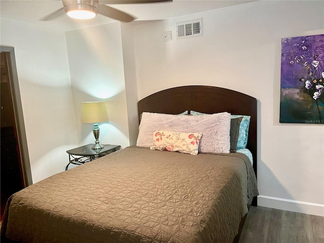 1478 Alternate Keene Rd, Largo, FL 33771 - bedroom featuring baseboards, visible vents, a ceiling fan, and wood finished floors