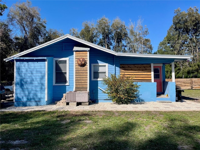 1478 Alternate Keene Rd, Largo, FL 33771 - view of front facade with a front lawn