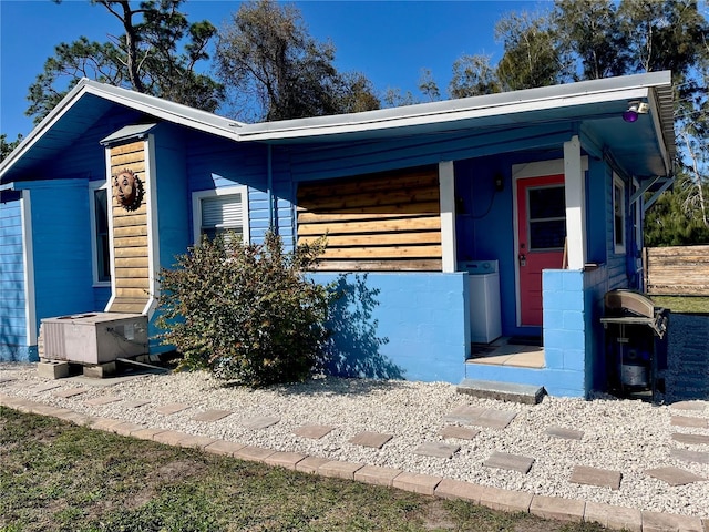 1478 Alternate Keene Rd, Largo, FL 33771 - view of front of house featuring concrete block siding