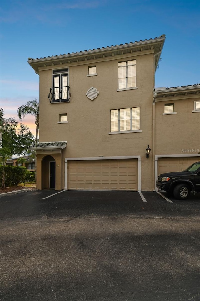 view of front of home with a garage