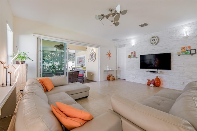 tiled living room with a healthy amount of sunlight