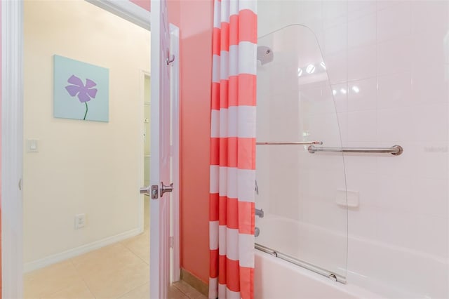 bathroom featuring tile patterned flooring and shower / bath combo with shower curtain