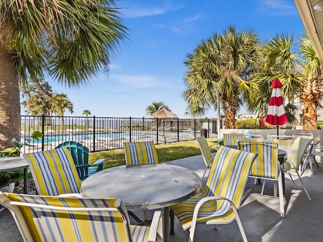 view of patio featuring a community pool