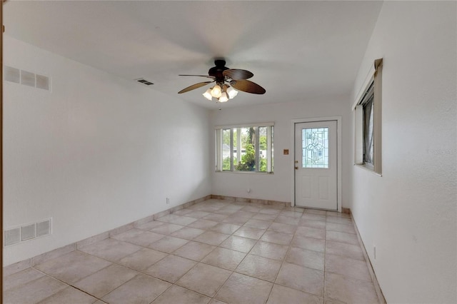 entrance foyer featuring ceiling fan