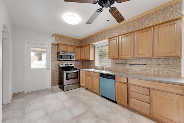 kitchen featuring light brown cabinetry, ceiling fan, appliances with stainless steel finishes, and a healthy amount of sunlight