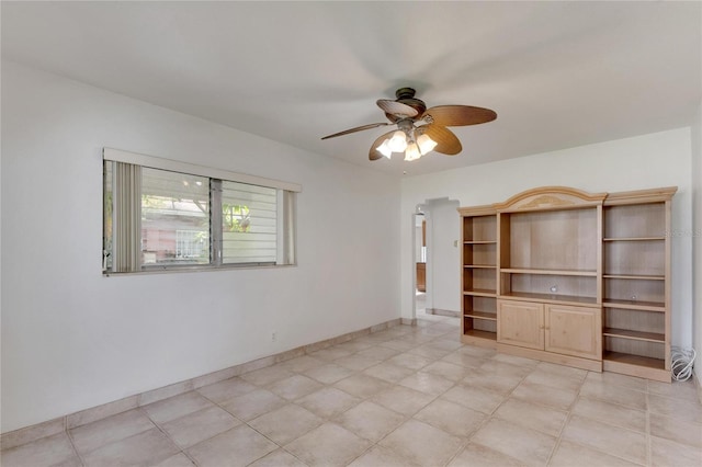 spare room featuring ceiling fan