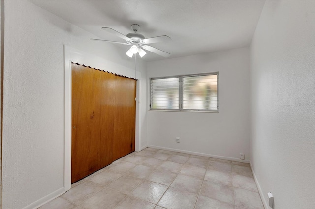 unfurnished bedroom with a closet and ceiling fan