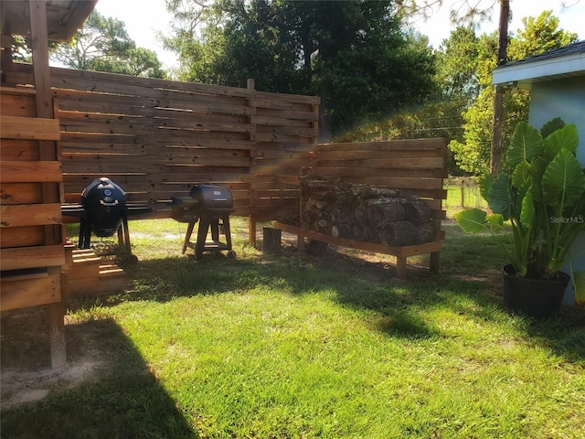 view of yard with fence