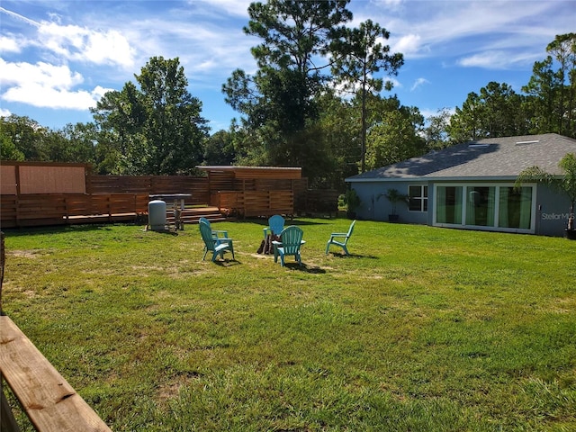 view of yard featuring fence