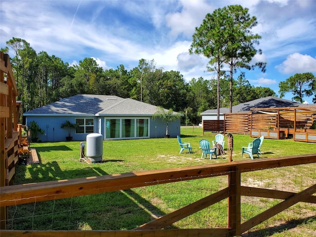 view of yard featuring fence