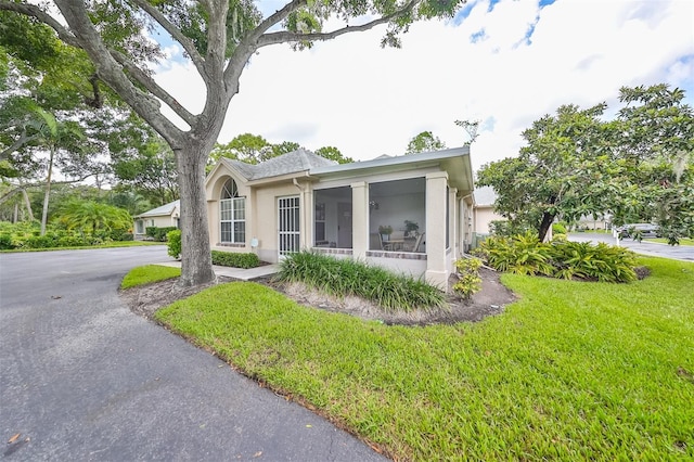 view of front of home with a front yard