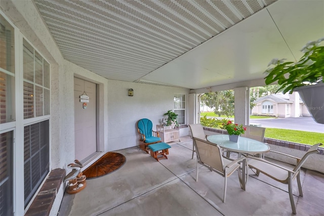 view of patio featuring outdoor dining space