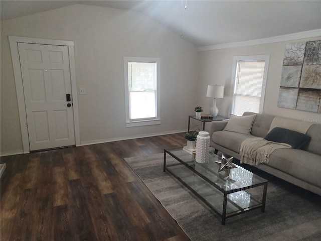 living room with dark hardwood / wood-style flooring and vaulted ceiling