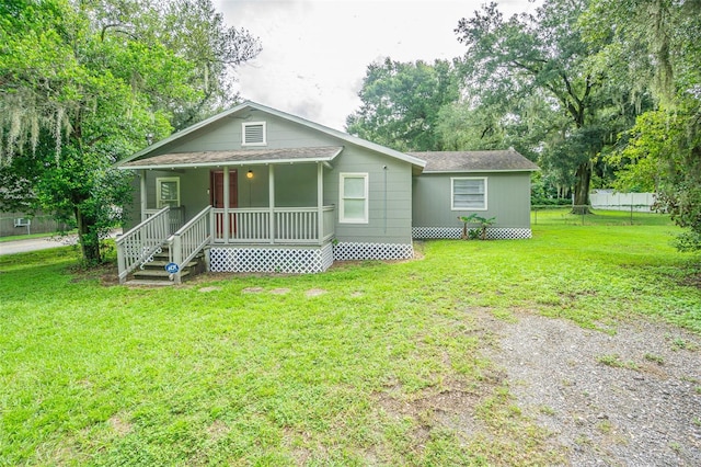 view of front of property with a front lawn and a porch