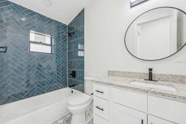 full bathroom featuring vanity, toilet, tiled shower / bath combo, and vaulted ceiling