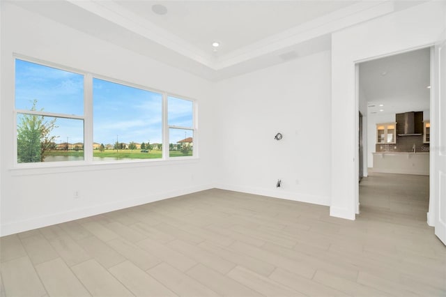 unfurnished room with recessed lighting, baseboards, and light wood finished floors