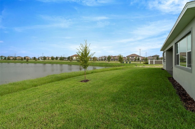 view of yard with a water view